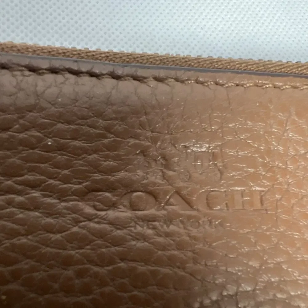 Coach wristlet some